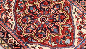A Semi-antique Heriz rug, 90 x 78 cm.