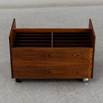 ROLF HESLAND, a rosewood veneered newspaper/LP stand from Bruksbo, Norway.