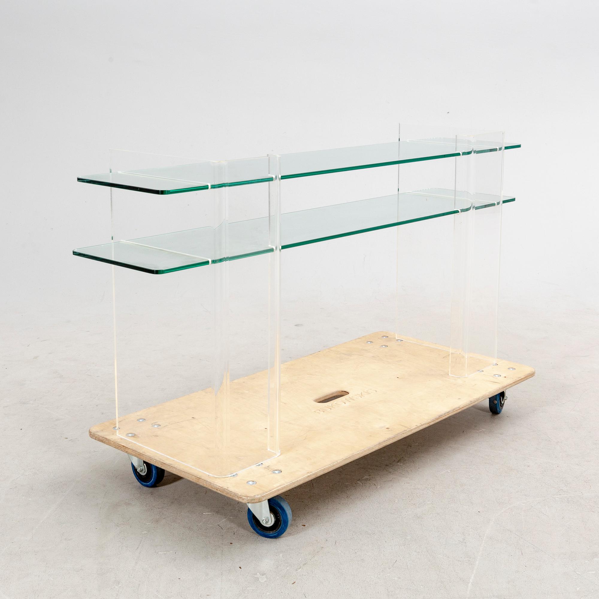 A late 20th century plexi and glass sideboard.