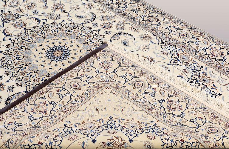 A CARPET, Nain part silk, s.k 9LAA, ca  303 x 202 cm.