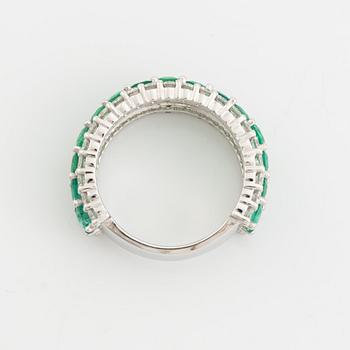 Emerald and brilliant cut diamond ring.