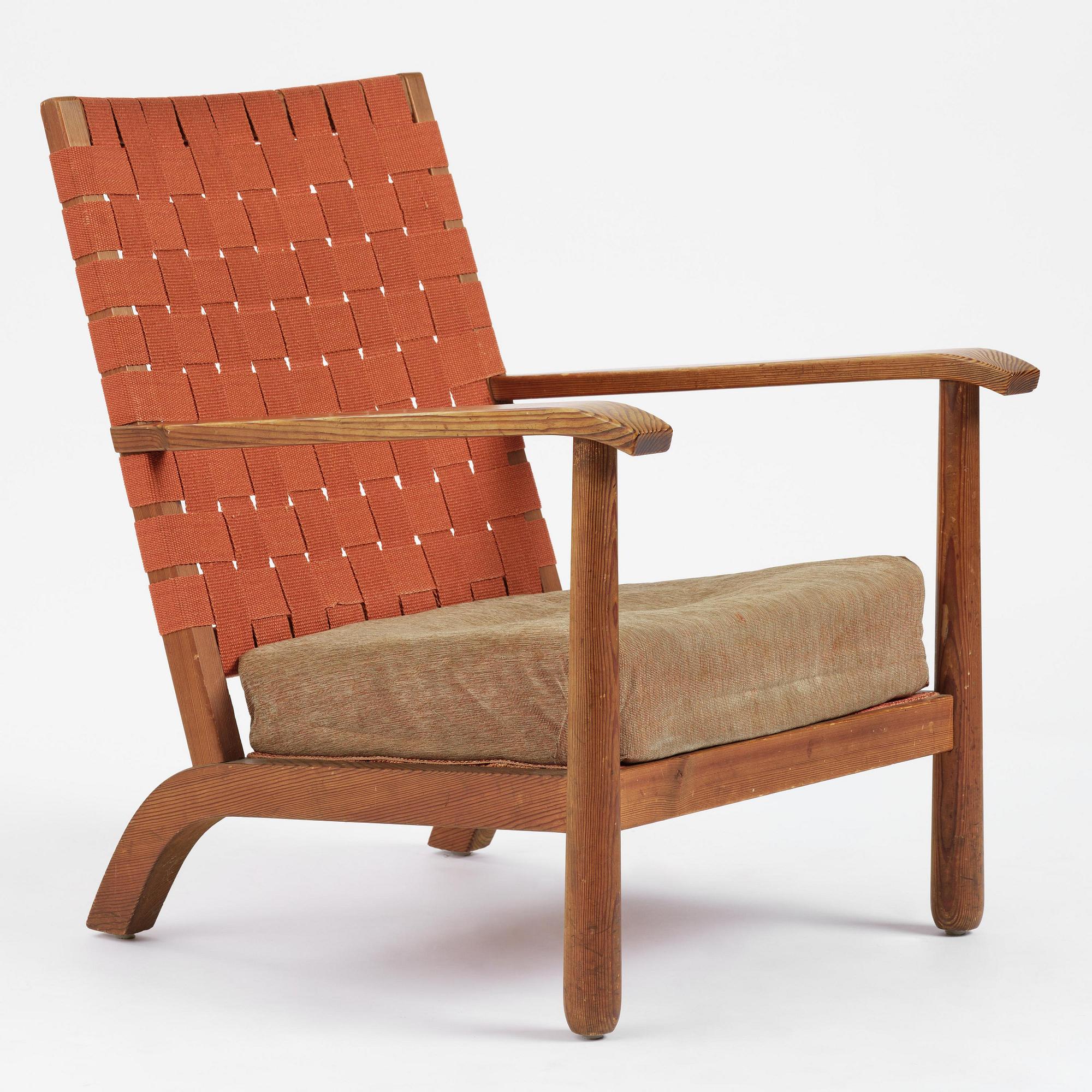 Axel Einar Hjorth, a stained pine "Väddö" easy chair, Nordiska Kompaniet, Sweden, 1930s-40s.