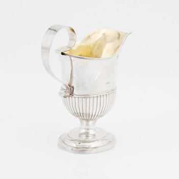 A Swedish Empire Parcel-Gilt Silver Creamer, mark of Johannes Lindegren, Falkenberg 1813.