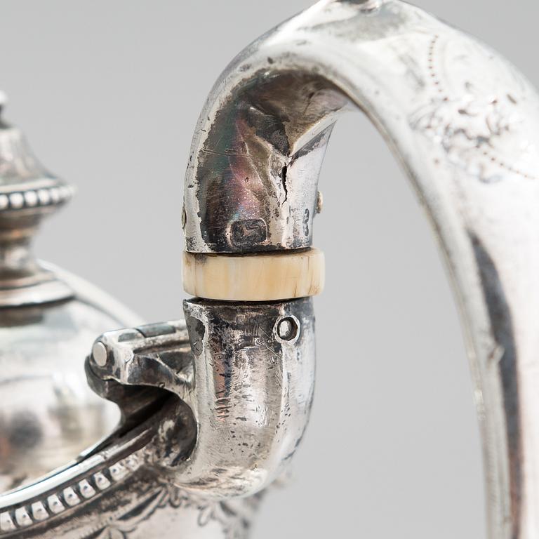 MARTIN, HALL & CO, A sterling silver pitcher, Sheffield 1873.