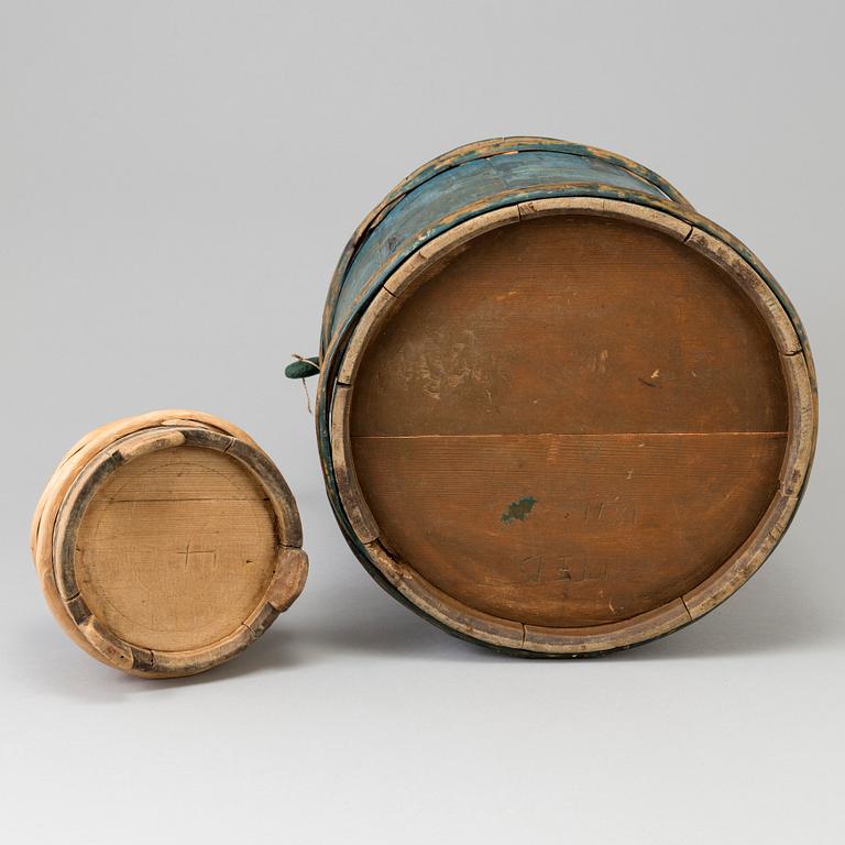 two wooden barrels from the late 19th century.