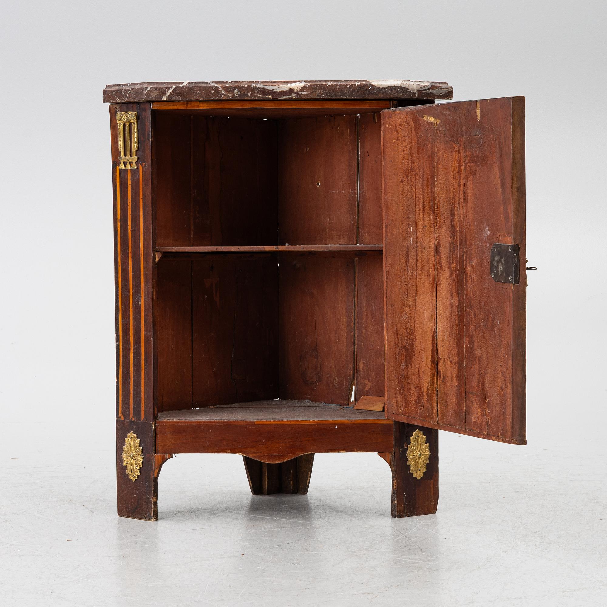 A pair of corner cabinets, Directoire, France, circa 1800.