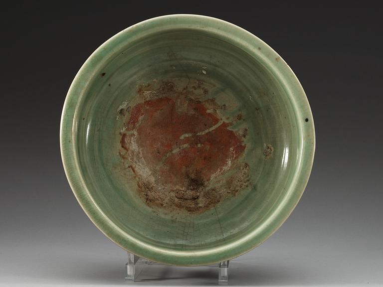 A large celadon tripod censer, Ming dynasty (1368-1644).