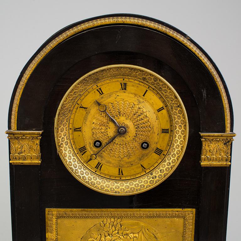 An enpire mantle clock, first half oc the 19th Century.