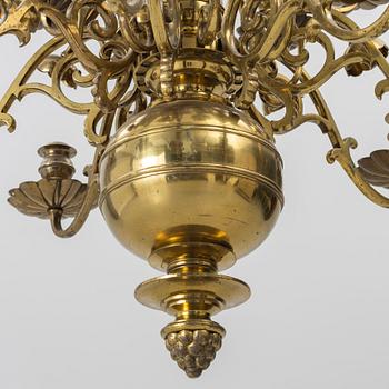 A Baroque style brass chandelier, 20th century.