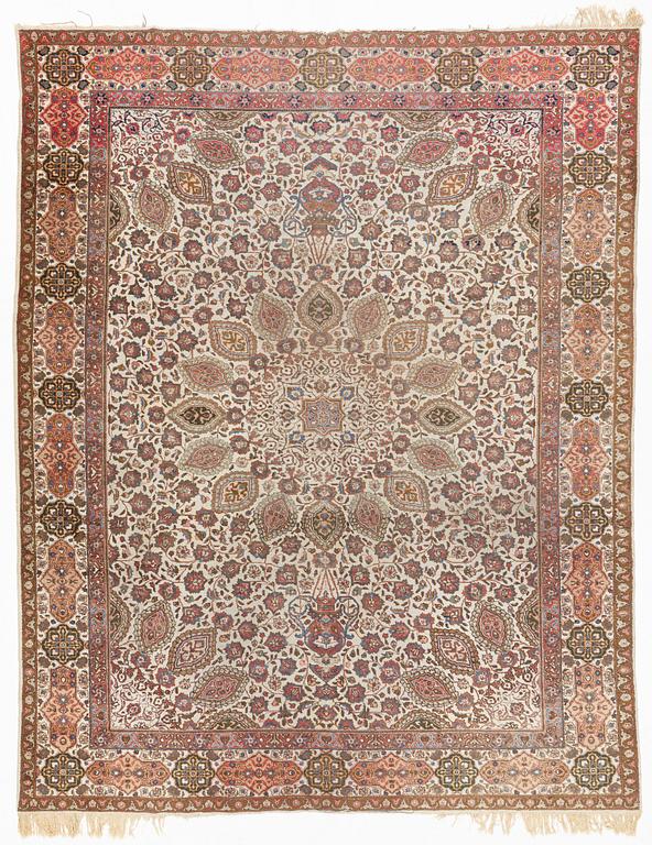 A Tabriz carpet, c. 390 x 305 cm.