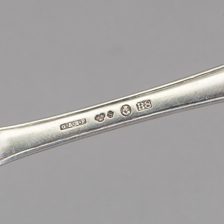 A set of 10 silver fruit knives, Stockholm, 1807 and a mixed lot of  silver fruit forks. Weight 600 g.
