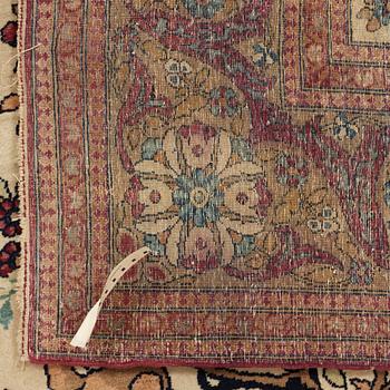 A CARPET, a semi-antique Esfahan figural, 215,5 x 140,5 cm.