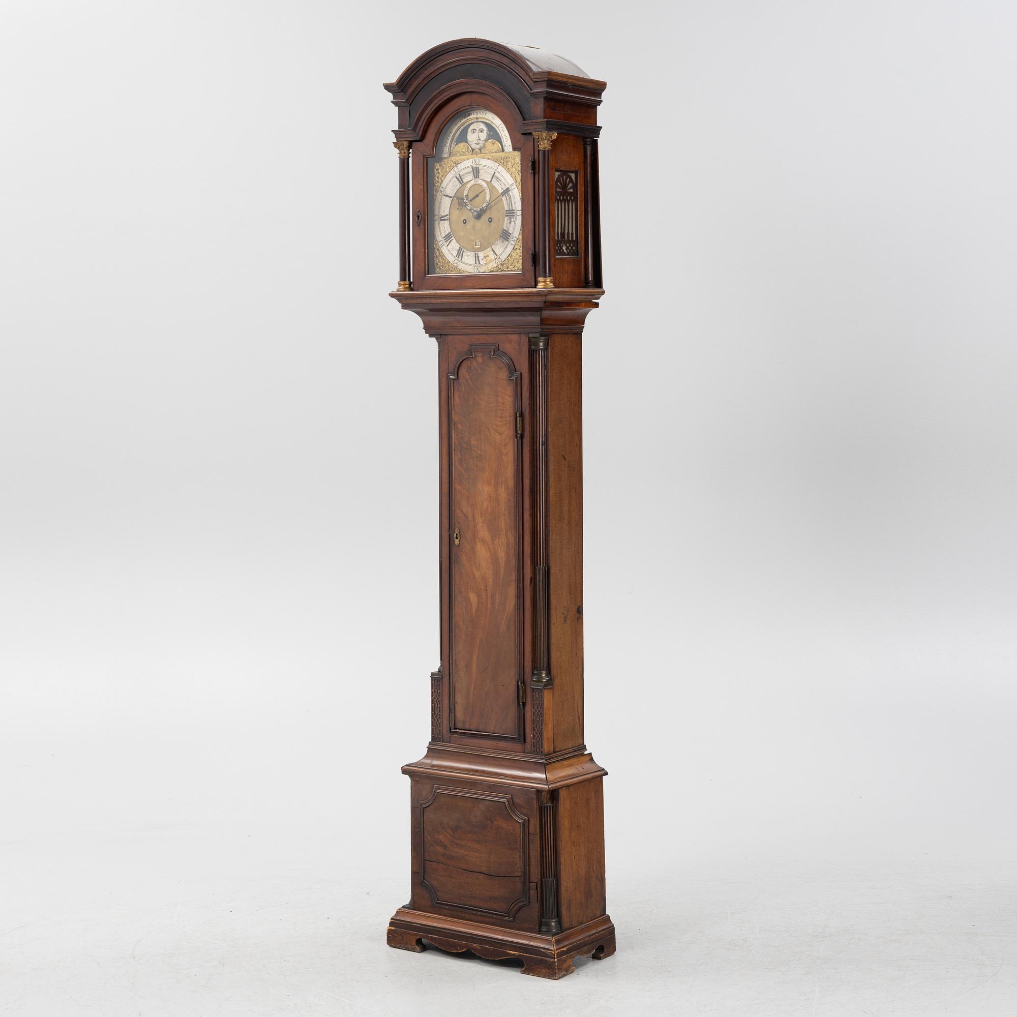 A mahogany veneered longcase clock, marked Peter Pohlmann, London, England, 18th century.