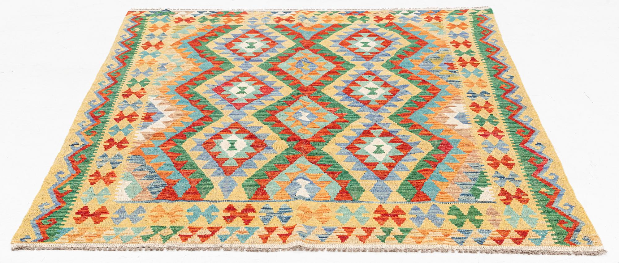 A Kilim rug approximately 190 x 150 cm.