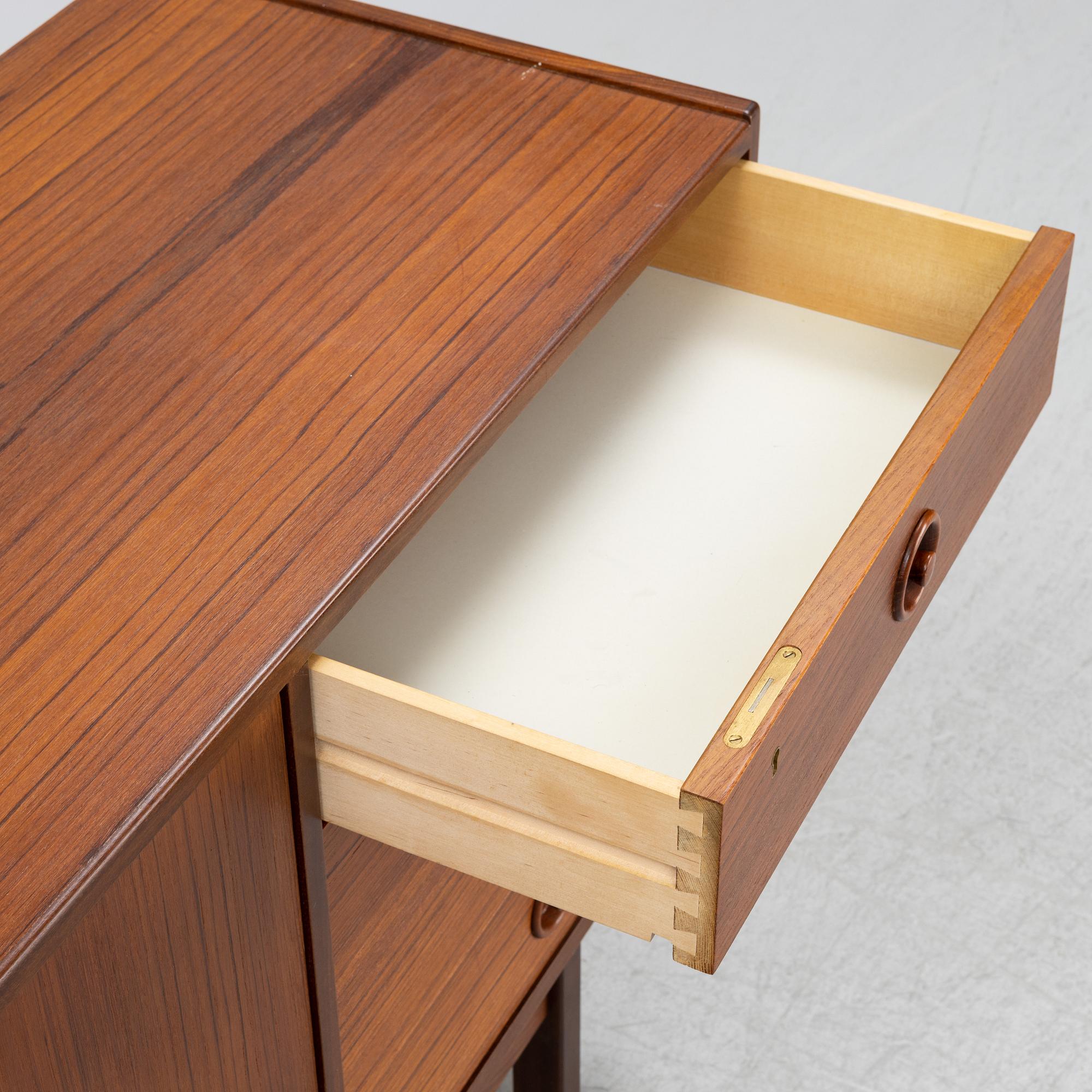 A teak veneered sideboard, mid 20th Century.