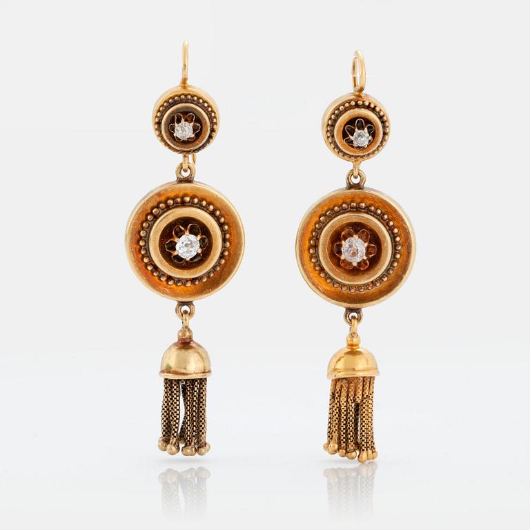A BROOCH and A PAIR OF EARRINGS set with old-cut diamonds.