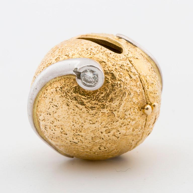 OLE LYNGGAARD, A 18K gold lock with small diamonds,.