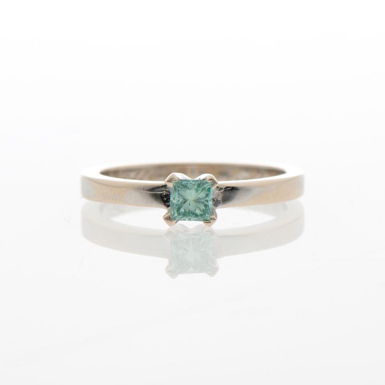 A RING, treated green diamond, 14K white gold.