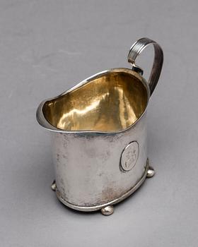 A Swedish early 19th century parcel-gilt milk-jug, mark of HI Lyberg, Borås 1820.