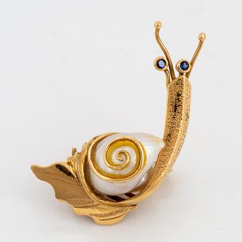 Gold and pearl snail brooch.