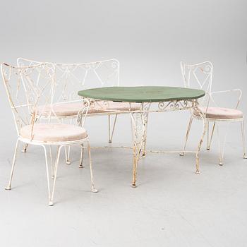 A four piece garden suite, mid-20th Century.