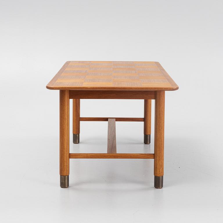 A Teak Veneer Coffee Table, mid 20th century.