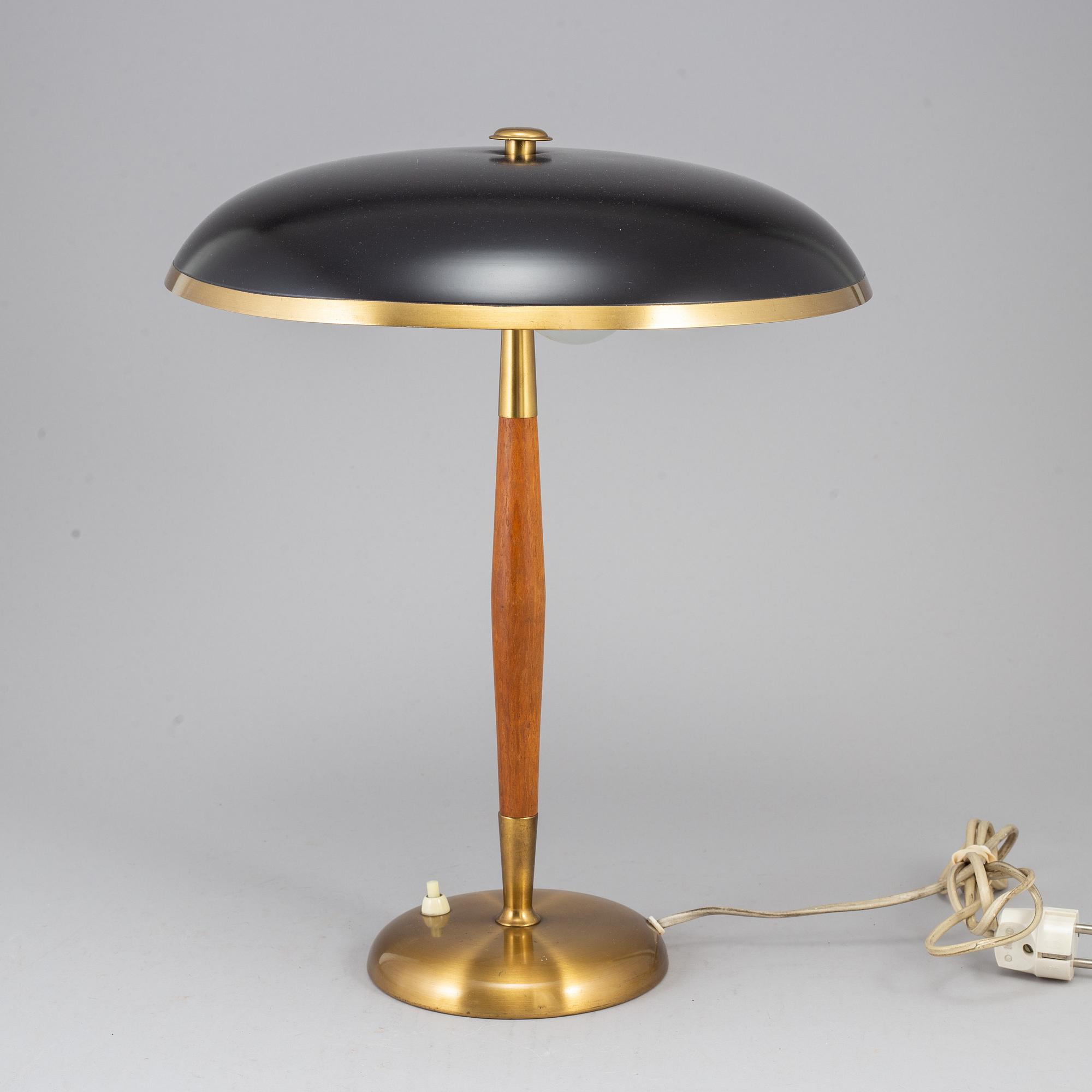 A Boréns brass and teak table lamp. Borås, Sweden mid 20th century.