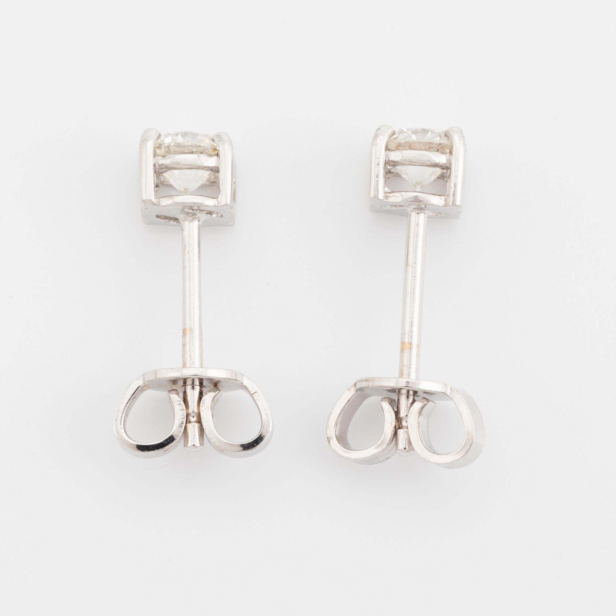 Brilliant cut diamond stud earrings, with IGI report.