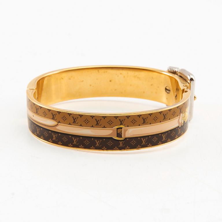 Louis Vuitton, Plånbok "Zoe" samt armband.