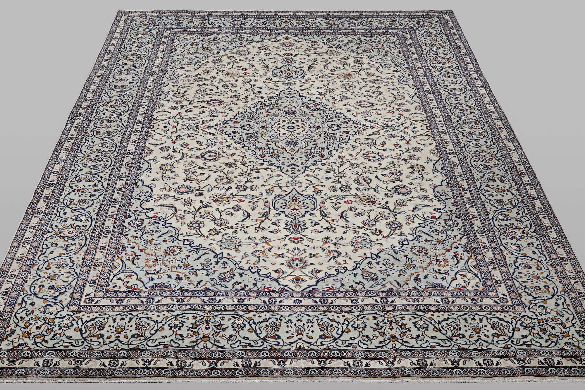 A carpet, Kashan, ca 355 x 247 cm.
