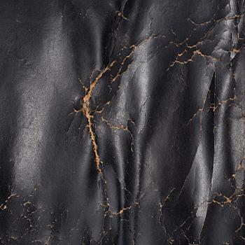 An easy chair and ottoman by Charles & Ray Eames, Herman Miller, USA, produced with licence by Hille, London.