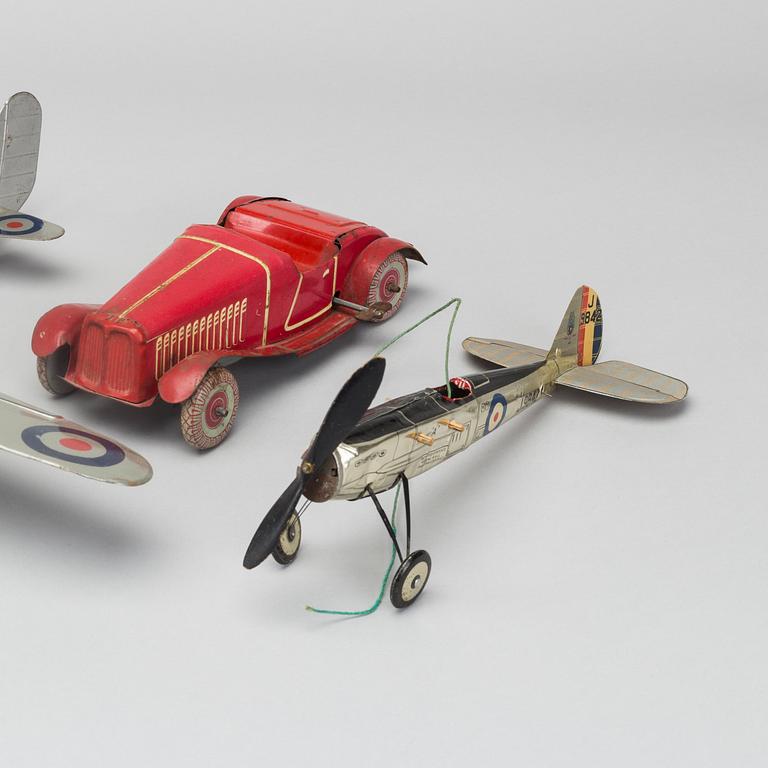 A COLLECTION OF MECHANICAL TIN TOYS, ONE  Frog Interceptor Fighter  Mark IV" England 1930'S.