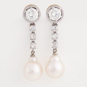 Brilliant-cut diamond and pearl earrings.