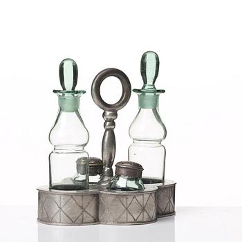 Nils Fougstedt, a pewter and glass cruet-set, Svenskt Tenn, Stockholm 1925, model 163.