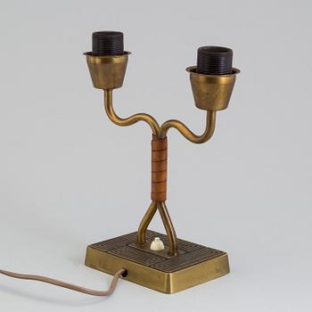 A 1940s Sonja Katzin brass table light from Asea.