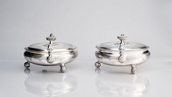 A pair of Swedish parcel-gilt silver bowls with covers, mark of S.A.Ackland, 1953 and 1963.