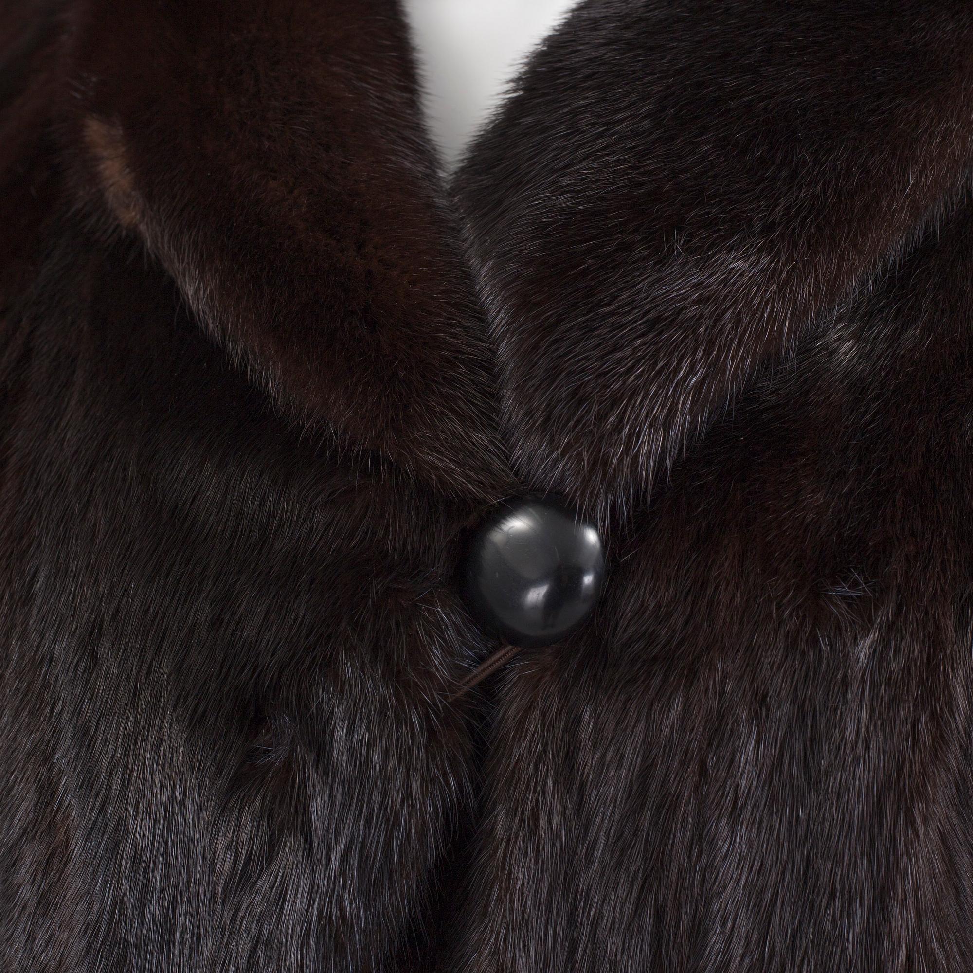 A SAGAMINK, coat, by Levinsky Design Copenhagen, in size 42.