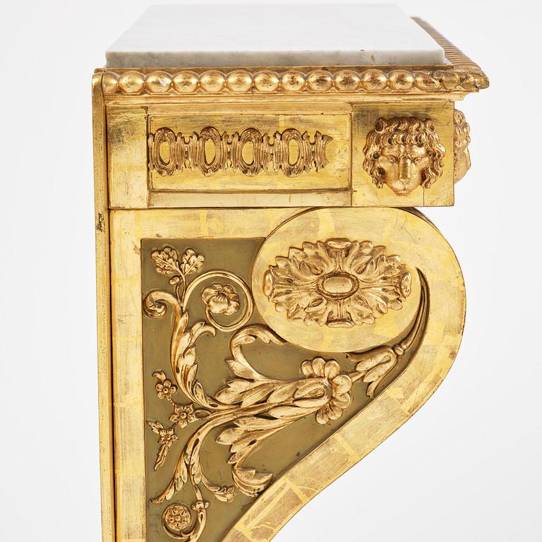 An Empire giltwood and gesso console table by P.G. Bylander (master in Gothenburg 1811-58).