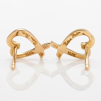 Tiffany & Co, Paloma Picasso, a pair of 18K yellow gold 'Loving Heart' earrings.