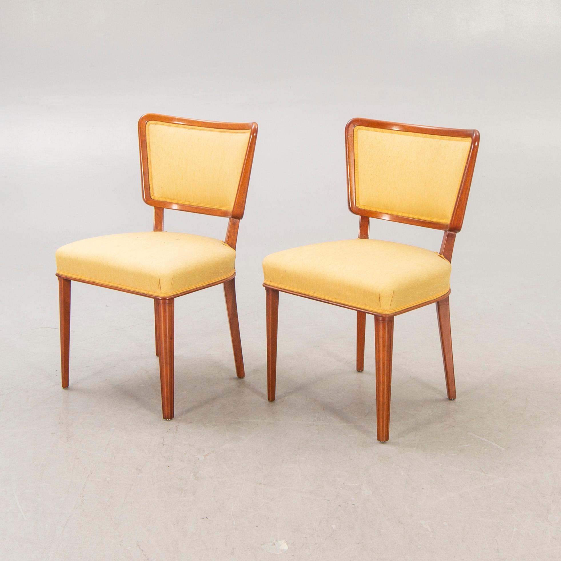 A set of ten Swedish modern 1950s mahogany chairs.