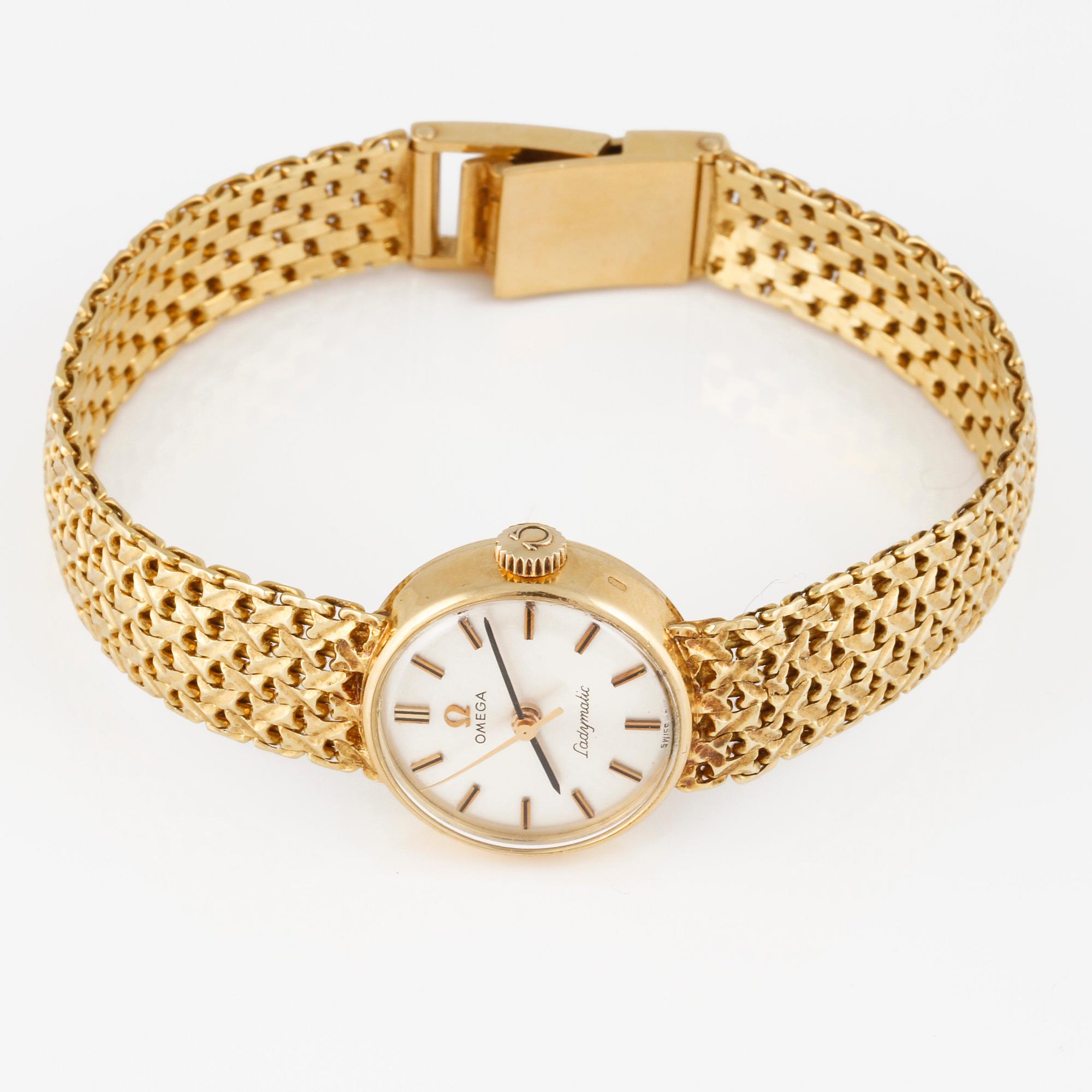 ARMBANDSUR, dam, guld, "Ladymatic" Omega. Total vikt 39 g.