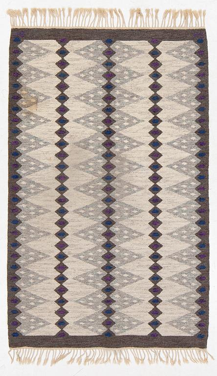 Berit Koenig,a flat weave rug, signed SH BK, c. 208 x 132 cm.