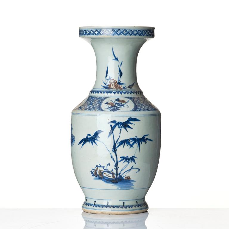 A blue and white and iron red vase. Qing dynasty, 19th century.