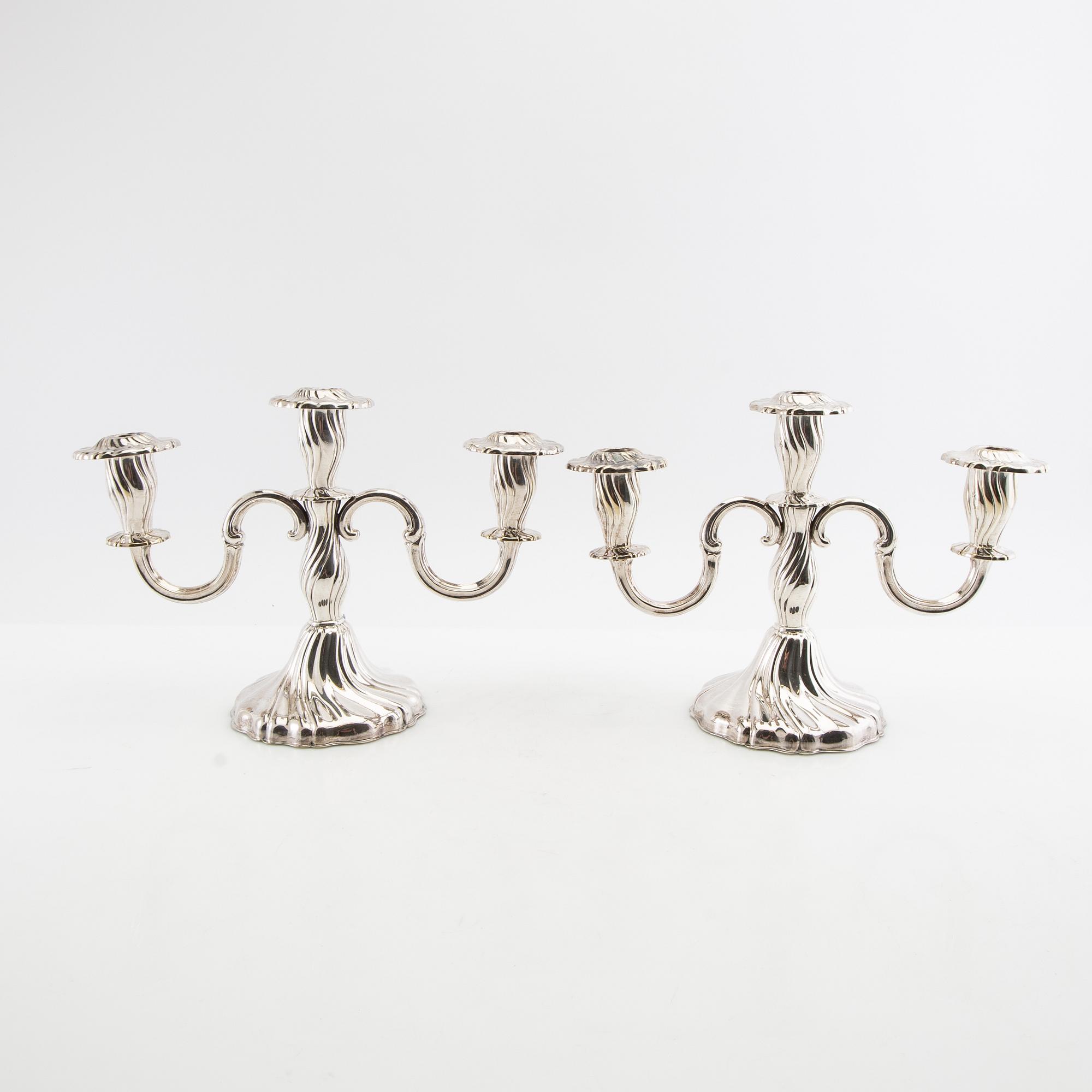 Candelabras a pair and candlesticks a pair Rococo style silver plate 20th century.