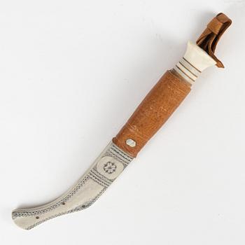 A reindeer horn knife by Johan Tuuri, signed.