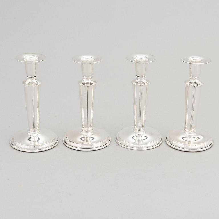 Four Swedish Silver Candlesticks, mark of Tenn & Silver Ab, Gothenburg 1955-56.