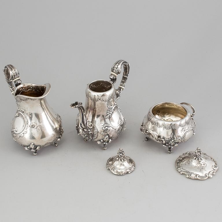 A SILVER COFFEEPOT, SUGARBOWL AND SIMILAR JUG, Hungary-Austria, ca 1900. Weight ca 1327 g.
