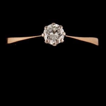 RING, 18k guld och vitguld med briljantslipad diamant, 0.24 ct,  Kaplans, Stockholm, 1990. Vikt 2 g.