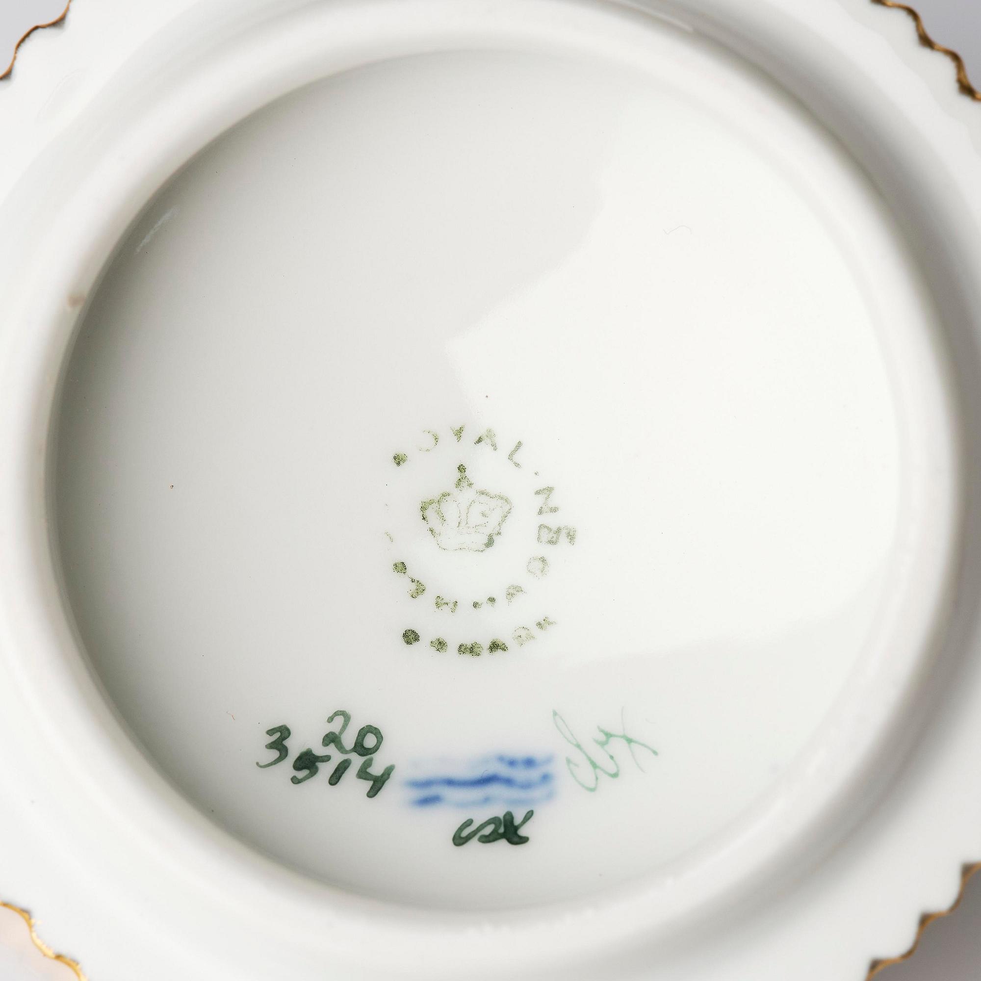 A set with four Royal Copenhagen 'Flora Danica' custard cups with covers and stands, Denmark, 20th century.