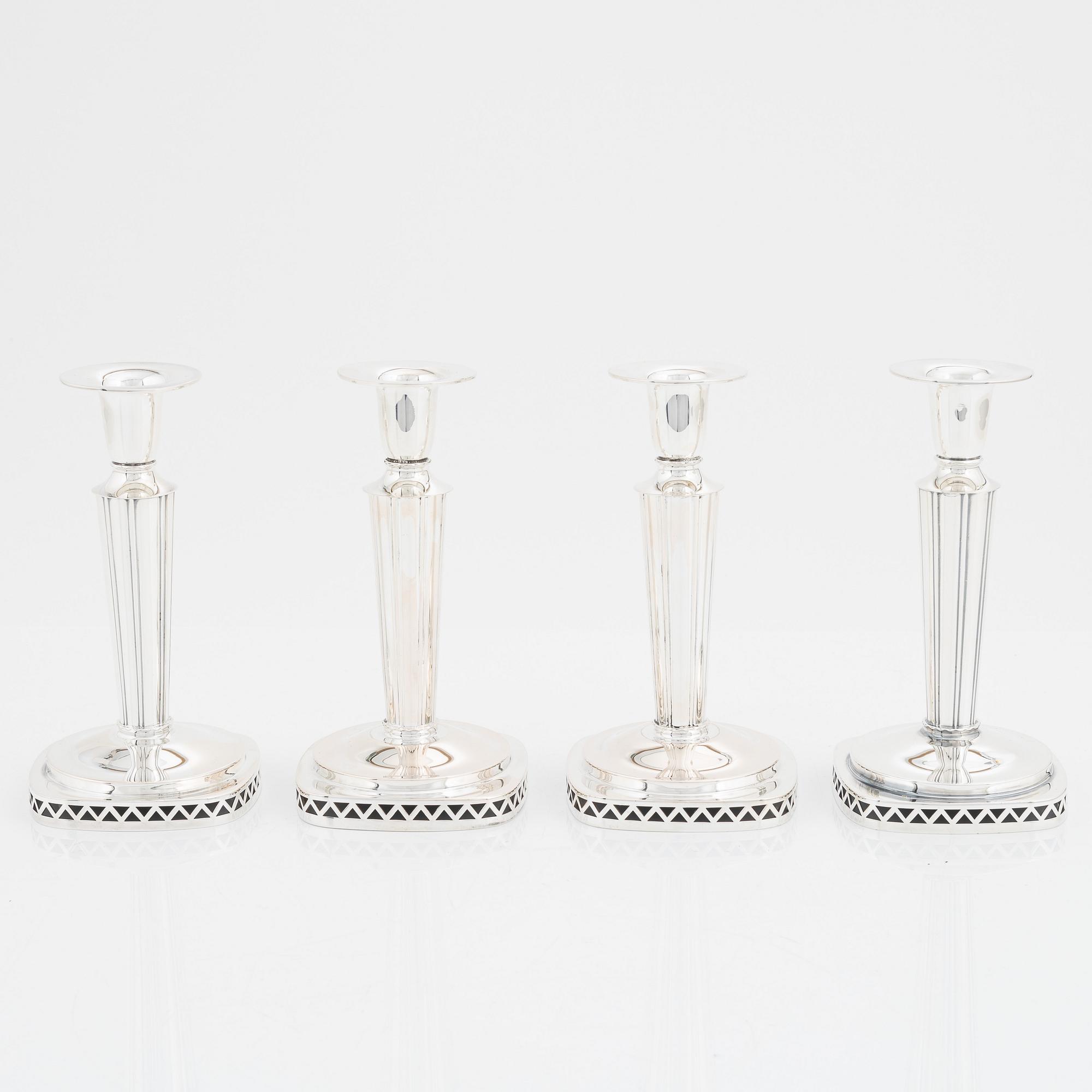 A set of four silver candlesticks by  Tesi, 1955-59.